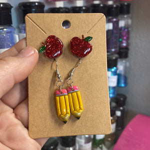 Pencil and apple earrings